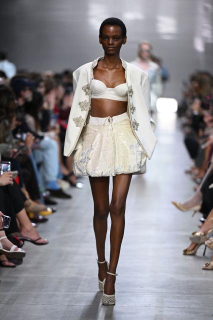 A model walks the runway during the Ermanno Scervino collection show as part of Women's Spring/Summer 2027 Milan's fashion week, on September 26, 2026. (Photo by Piero CRUCIATTI / AFP)
