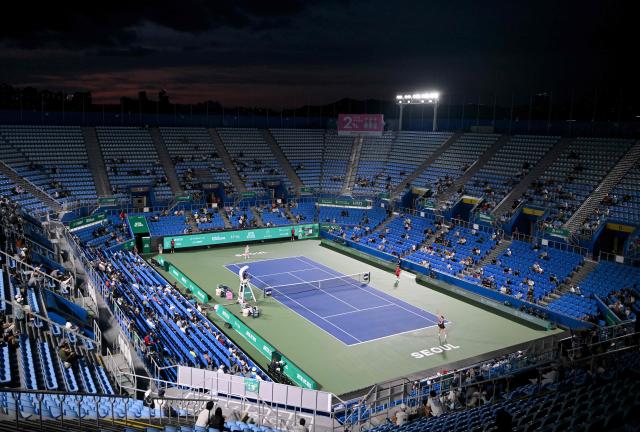 Alina Korneeva of Russia (R) hits a return against Maya Joint of Australia (L) during their women’s singles semi-final match at the Korea Open tennis championships in Seoul on September 26, 2026. (Photo by Jung Yeon-je / AFP)