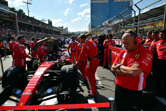 Ferrari's French team principal Frederic Vasseur follows the team's preparations on the grid prior to the Formula One Azerbaijan Grand Prix at the Baku City Circuit in Baku on September 26, 2026. (Photo by Andrej ISAKOVIC / AFP)