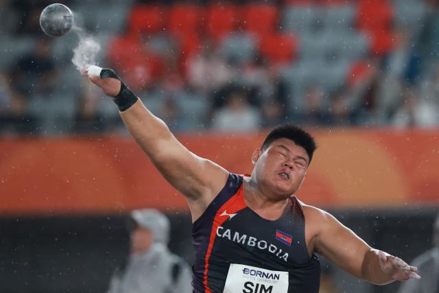 Cambodia's Samedy Sim competes in the men's shot put final during the 2026 Asian Games at Nagoya City Mizuho Park Athletic Stadium in Nagoya, Aichi Prefecture on September 26, 2026. (Photo by DAVID GRAY / AFP)