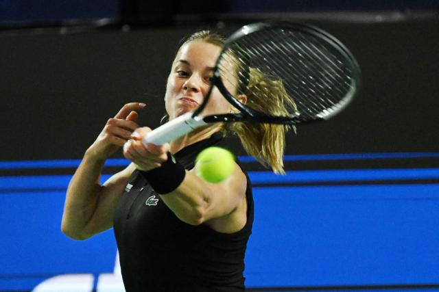 Poland's Maja Chwalinska hits a return against Canada's Leylah Fernandez during the WTA Singapore Open Tennis semifinal in Singapore on September 26, 2026. (Photo by Roslan RAHMAN / AFP)