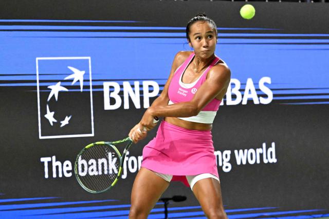 Canada's Leylah Fernandez returns a shot against Poland's Maja Chwalinska during the WTA Singapore Open Tennis semifinal in Singapore on September 26, 2026. (Photo by Roslan RAHMAN / AFP)