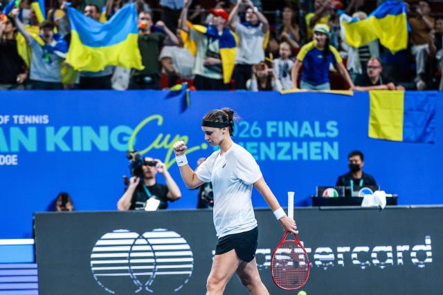 Ukraine’s Anhelina Kalinina reacts after beating Italy’s Tyra Grant in their women’s singles semi-final match at the Billie Jean King Cup tennis tournament in Shenzhen, in China’s southern Guangdong province on September 26, 2026. (Photo by CN-STR / AFP) / China OUT