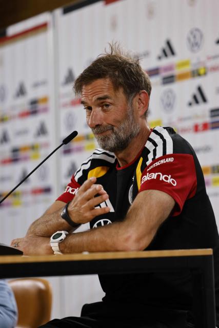 Germany's head coach Juergen Klopp addresses a press conference in Herzogenaurach, southern Germany on September 26, 2026, ahead of the UEFA Nations League football match Germany v Greece on September 27. (Photo by Alexandra BEIER / AFP)