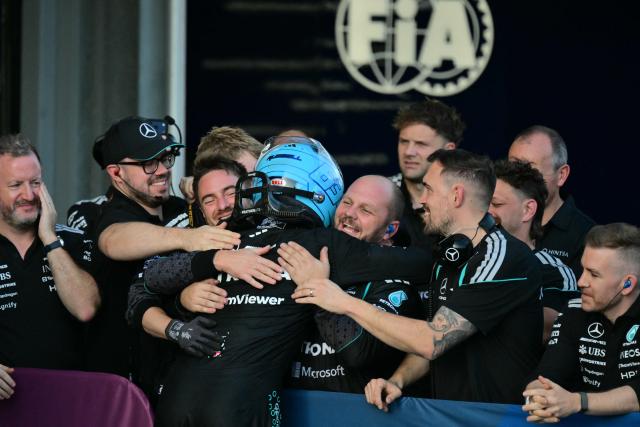 Mercedes' British driver George Russell celebrates after winning the Formula One Azerbaijan Grand Prix at the Baku City Circuit in Baku on September 26, 2026. (Photo by Andrej ISAKOVIC / AFP)
