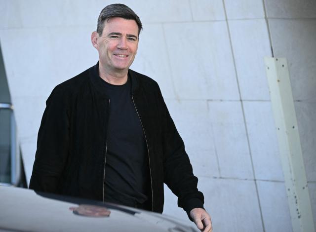 Britain's Prime Minister Andy Burnham arrives to visit the new ferry ahead of the annual Labour Party conference in Liverpool, north-west England, on September 26, 2026. Britain's ruling Labour Party gathers Sunday for its first annual conference under Andy Burnham's leadership, heartened by his start as prime minister but now looking for concrete plans to tackle looming challenges. (Photo by Oli SCARFF / AFP)