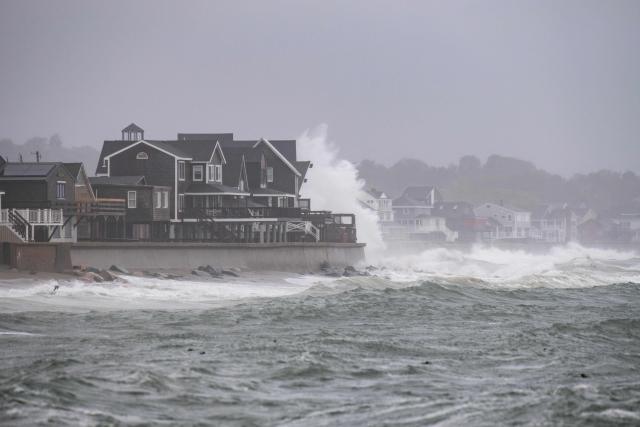 Waves pound the coast as the tide comes in during a NorEaster storm in Scituate, Massachusetts on September 26, 2026. More than 40 million people in the northeastern United States braced September 25 for heavy rain and strong winds as an unusually powerful storm for the season was forecast to crash into the region. New York, Boston and Philadelphia were all in the firing line of the "Nor'easter" -- so labeled for its northeasterly winds -- as authorities warned of potential flooding, downed trees and damaged power lines. (Photo by Joseph Prezioso / AFP)