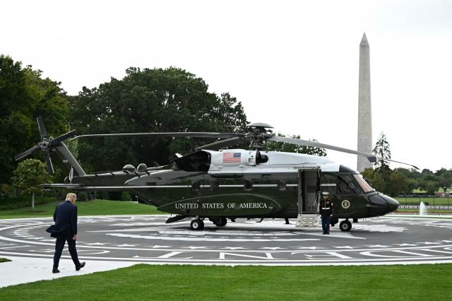 US President Donald Trump walks to board Marine One as he departs from the South Lawn of the White House in Washington, DC, on September 26, 2026. US President Donald Trump is heading to Knoxville, Tennessee to attend the Tennessee/Texas college football game. (Photo by Alex WROBLEWSKI / AFP)