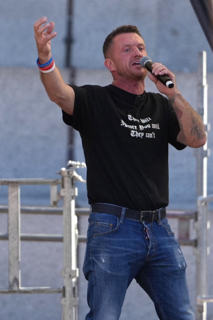 British far-right activist Tommy Robinson, real name Stephen Yaxley-Lennon speaks to the crowd in Trafalgar Square following a march organised by togetherforthechildren in central London on September 26, 2026. (Photo by CARLOS JASSO / AFP)