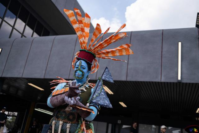 A cosplayer poses for a photograph during Comic Con Africa, one of Africa's largest pop culture, fantasy and gaming festivals, at the Johannesburg Expo Centre in Johannesburg on September 26, 2026. Comic Con Africa is a pop culture and gaming convention that brings together fans of comics, films, television, gaming, cosplay and related entertainment, attracting exhibitors, creators and enthusiasts from across Africa and beyond. (Photo by Cecilia Seregni / AFP)