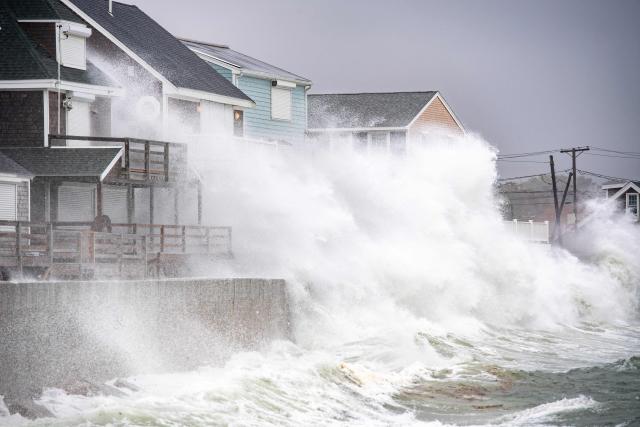 Waves pound the coast as the tide comes in during a NorEaster storm in Scituate, Massachusetts on September 26, 2026. More than 40 million people in the northeastern United States braced September 25 for heavy rain and strong winds as an unusually powerful storm for the season was forecast to crash into the region. New York, Boston and Philadelphia were all in the firing line of the "Nor'easter" -- so labeled for its northeasterly winds -- as authorities warned of potential flooding, downed trees and damaged power lines. (Photo by Joseph Prezioso / AFP)