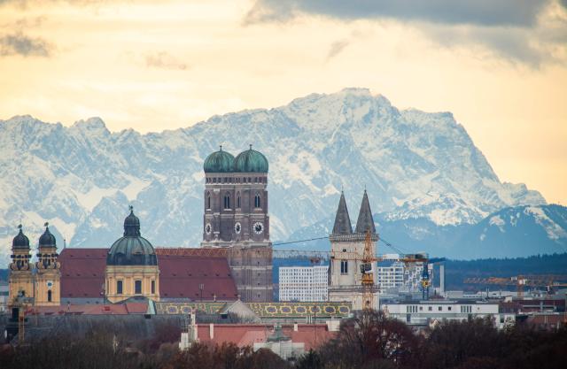 (FILES) Munich's skyline is pictured in front of the Alps on November 28, 2019 in Munich, southern Germany. Munich was on September 26, 2026 selected ahead of the Cologne/Rhine-Ruhr region by the German Olympic Committee (DOSB) as part of a bid to host the 2036, 2040 or 2044 Summer Games. (Photo by Peter Kneffel / dpa / AFP) / Germany OUT
