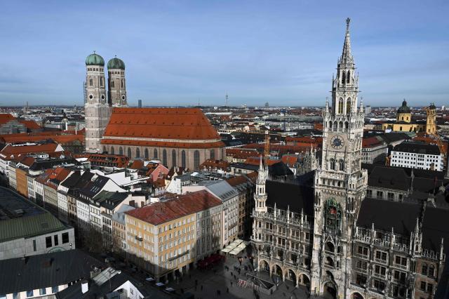 (FILES) A picture taken on February 13, 2020 shows a view of the church of Our Lady, Frauenkirche (L) and the city hall (R) at the Marienplatz in Munich, southern Germany. Munich was on September 26, 2026 selected ahead of the Cologne/Rhine-Ruhr region by the German Olympic Committee (DOSB) as part of a bid to host the 2036, 2040 or 2044 Summer Games. (Photo by Christof STACHE / AFP)