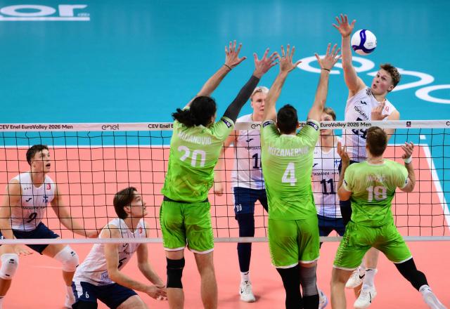 Finland's Opposite Hitter #24 Nooa Marttila spikes the ball during the CEV EuroVolley 2026 men's bronze medal volleyball match final between Finland and Slovenia at the Forum of Assago, on September 26, 2026. (Photo by Marco BERTORELLO / AFP)