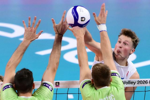 Finland's Opposite Hitter #24 Nooa Marttila spikes the ball during the CEV EuroVolley 2026 men's bronze medal volleyball match final between Finland and Slovenia at the Forum of Assago, on September 26, 2026. (Photo by Marco BERTORELLO / AFP)