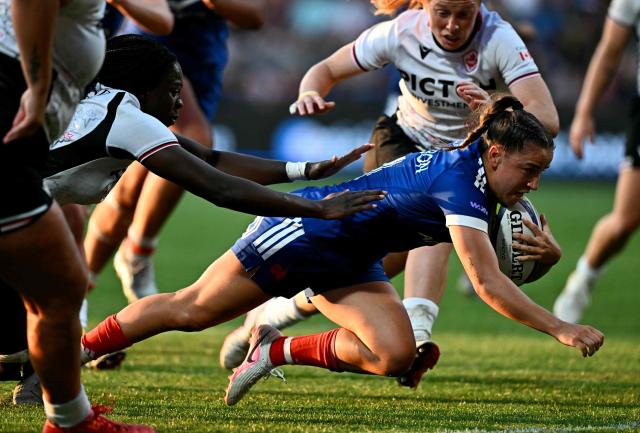 France's flanker Lea Champon scores a try during the women's WXV Global Series rugby match between France and Canada at the Stade Marcel Deflandre, in La Rochelle, central-eastern France, on September 26, 2026. (Photo by Christophe ARCHAMBAULT / AFP)