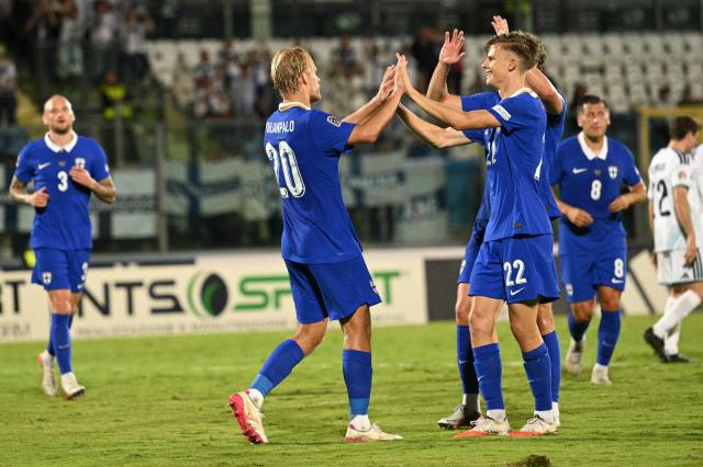 Finland's forward #20 Joel Pohjanpalo celebrates with Finland's forward #22 Adrian Svanback scoring a penalty during the UEFA Nations League (League C, Group 1) football match between San Marino and Finland at the Serravalle's stadium in San Marino, on September 26, 2026. (Photo by Andreas SOLARO / AFP)