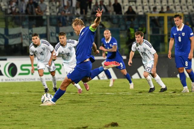 Finland's forward #20 Joel Pohjanpalo kicks and scores a penalty during the UEFA Nations League (League C, Group 1) football match between San Marino and Finland at the Serravalle's stadium in San Marino, on September 26, 2026. (Photo by Andreas SOLARO / AFP)