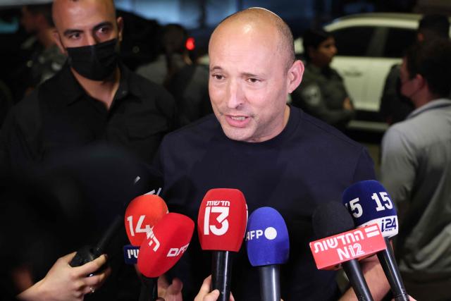 Former Israeli prime minister Naftali Bennett, speaks to the media outside the house of former Israeli prime minister and opposition leader Yair Lapid, after attending a meeting for the leaders of the Change Bloc, also known as Gush HaShinui or the anti-Netanyahu bloc, ahead of Israel's legislative elections, in the coastal city of Tel Aviv on September 26, 2026. Israel heads to the polls on October 27 in its first election since the October 7, 2023 Hamas-led attack, in what is seen as a referendum on Prime Minister Benjamin Netanyahu. (Photo by Jack GUEZ / AFP)