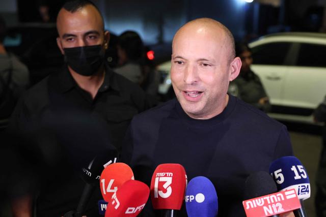 Former Israeli prime minister Naftali Bennett, speaks to the media outside the house of former Israeli prime minister and opposition leader Yair Lapid, after attending a meeting for the leaders of the Change Bloc, also known as Gush HaShinui or the anti-Netanyahu bloc, ahead of Israel's legislative elections, in the coastal city of Tel Aviv on September 26, 2026. Israel heads to the polls on October 27 in its first election since the October 7, 2023 Hamas-led attack, in what is seen as a referendum on Prime Minister Benjamin Netanyahu. (Photo by Jack GUEZ / AFP)