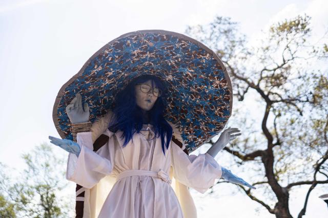 A cosplayer gestures during Comic Con Africa, one of Africa's largest pop culture, fantasy and gaming festivals, at the Johannesburg Expo Centre in Johannesburg on September 26, 2026. Comic Con Africa is a pop culture and gaming convention that brings together fans of comics, films, television, gaming, cosplay and related entertainment, attracting exhibitors, creators and enthusiasts from across Africa and beyond. (Photo by Cecilia Seregni / AFP)
