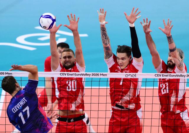 France's Outside Hitter #17 Trevor Clevenot spikes the ball during the CEV EuroVolley 2026 men's gold medal final volleyball match between France and Poland at the Forum of Assago, on September 26, 2026. (Photo by Marco BERTORELLO / AFP)