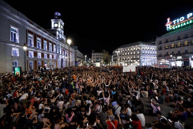 Demonstrators protest against evictions and the housing crisis in front of the Presidency of the Community of Madrid on the Puerta del Sol plaza in Madrid on September 26, 2026. The sign reads: 'accessible housing'. Spain's main tenants' unions on September 25 urged the government to pass a new law to tackle the country's housing crisis after an 87-year-old was evicted from her Madrid home, sparking nationwide protests. (Photo by Oscar DEL POZO / AFP)