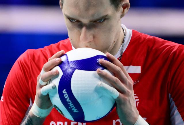 Poland's Middle Blocker #07 Bartlomiej Lemanski holds the ball during the CEV EuroVolley 2026 men's gold medal final volleyball match between France and Poland at the Forum of Assago, on September 26, 2026. (Photo by Marco BERTORELLO / AFP)