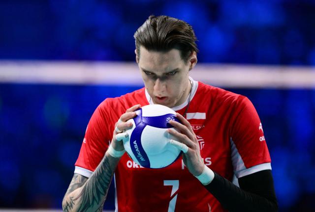 Poland's Middle Blocker #07 Bartlomiej Lemanski holds the ball during the CEV EuroVolley 2026 men's gold medal final volleyball match between France and Poland at the Forum of Assago, on September 26, 2026. (Photo by Marco BERTORELLO / AFP)