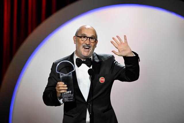 Spanish actor Javier Camara celebrates on stage after receiving the "Concha de Plata" (Silver Shell), best supporting performance award, for his role in "5 minutos mas" (5 minutes more) during the 74th San Sebastian International Film Festival closing ceremony in the northern Spanish Basque city of San Sebastian on September 26, 2026. (Photo by ANDER GILLENEA / AFP)