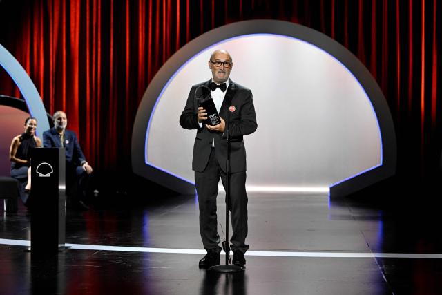 Spanish actor Javier Camara celebrates on stage after receiving the "Concha de Plata" (Silver Shell), best supporting performance award, for his role in "5 minutos mas" (5 minutes more) during the 74th San Sebastian International Film Festival closing ceremony in the northern Spanish Basque city of San Sebastian on September 26, 2026. (Photo by ANDER GILLENEA / AFP)