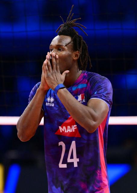 France's Middle Blocker #24 Mousse Gueye reacts during the CEV EuroVolley 2026 men's gold medal final volleyball match between France and Poland at the Forum of Assago, on September 26, 2026. (Photo by Marco BERTORELLO / AFP)