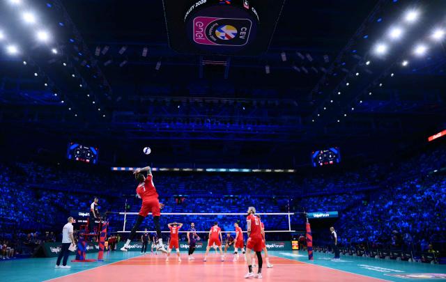 Poland's Middle Blocker #07 Bartlomiej Lemanski jumps to serve the ball during the CEV EuroVolley 2026 men's gold medal final volleyball match between France and Poland at the Forum of Assago, on September 26, 2026. (Photo by Marco BERTORELLO / AFP)
