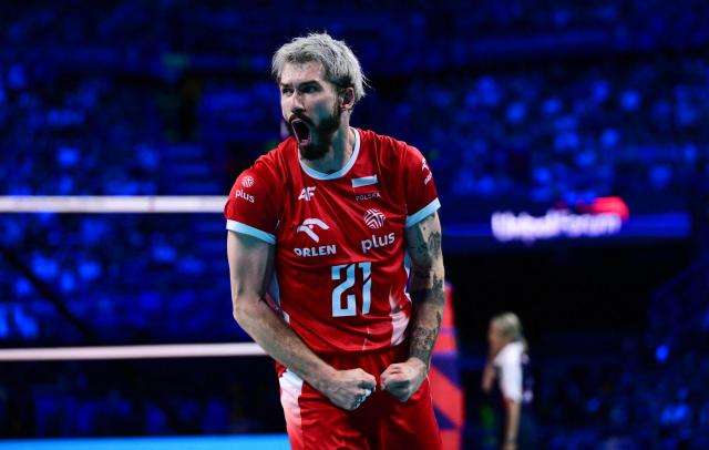 Poland's Opposite Hitter #21 Tomasz Fornal celebrates a point during the CEV EuroVolley 2026 men's gold medal final volleyball match between France and Poland at the Forum of Assago, on September 26, 2026. (Photo by Marco BERTORELLO / AFP)
