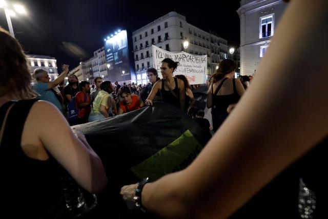 Demonstrators install tents as they camp during a protest against evictions and the housing crisis in front of the Presidency of the Community of Madrid on the Puerta del Sol plaza in Madrid on September 26, 2026. The sign reads: 'accessible housing'. Spain's main tenants' unions on September 25 urged the government to pass a new law to tackle the country's housing crisis after an 87-year-old was evicted from her Madrid home, sparking nationwide protests. (Photo by Oscar DEL POZO / AFP)