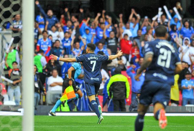 Cruz Azul's forward #07 Nicolas Ibanez celebrates after scoring the opening goal during the Liga MX Apertura tournament football match between Cruz Azul and Toluca at the Banorte Stadium in Mexico City on September 26, 2026. (Photo by Victor CRUZ / AFP)