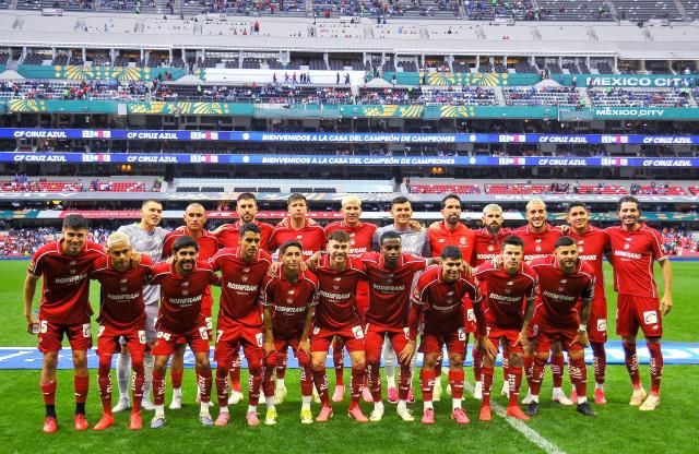 Toluca players pose for picturesahead of the Liga MX Apertura tournament football match between Cruz Azul and Toluca at the Banorte Stadium in Mexico City on September 26, 2026. (Photo by Victor CRUZ / AFP)
