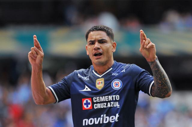 Cruz Azul's Uruguayan forward #21 Gabriel Fernandez celebrates after scoring his team's second goal during the Liga MX Apertura tournament football match between Cruz Azul and Toluca at the Banorte Stadium in Mexico City on September 26, 2026. (Photo by Victor CRUZ / AFP)