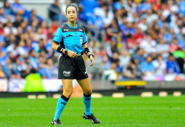 Mexican referee Katia Itzel Garcia gestures during the Liga MX Apertura tournament football match between Cruz Azul and Toluca at the Banorte Stadium in Mexico City on September 26, 2026. (Photo by Victor CRUZ / AFP)