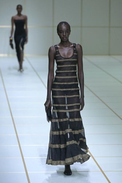 A model walks the runway during the Giorgio Armani collection show as part of Women's Spring/Summer 2027 Milan's fashion week, on September 27, 2026. (Photo by Stefano Rellandini / AFP)