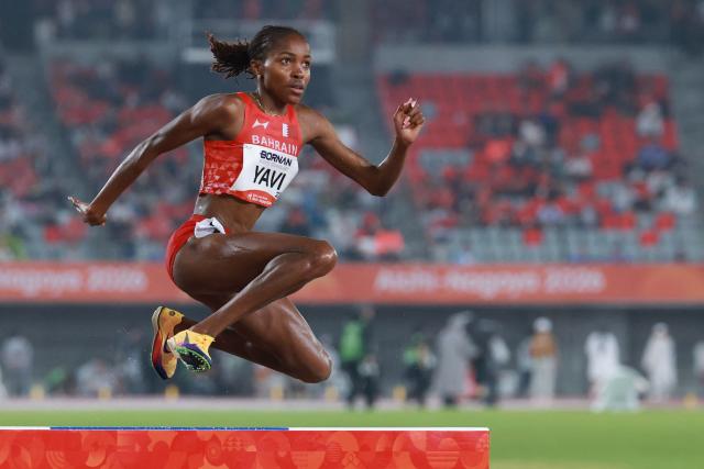 Bahrain's Winfred Yavi competes in the women's 3000m steeplechase final during the 2026 Asian Games at Nagoya City Mizuho Park Athletic Stadium in Nagoya, Aichi Prefecture on September 27, 2026. (Photo by DAVID GRAY / AFP)