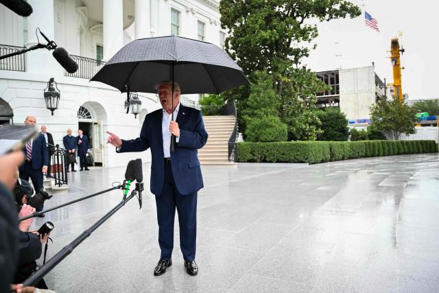 US President Donald Trump speaks to members of the press before boarding Marine One as he departs from the South Lawn of the White House in Washington, DC, on September 27, 2026. Trump is travelling to Chicago to attend the President's Cup closing ceremony. (Photo by Mandel NGAN / AFP)