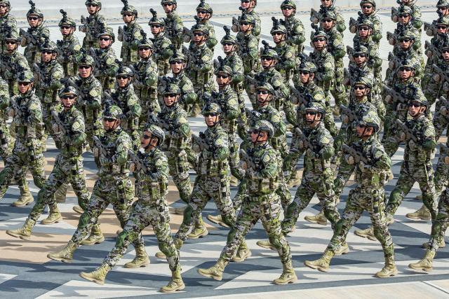 Servicemen march during a parade marking the 35th anniversary of Turkmenistan's independence in central Ashgabat on September 27, 2026. (Photo by Nikolay VAVILOV / AFP)