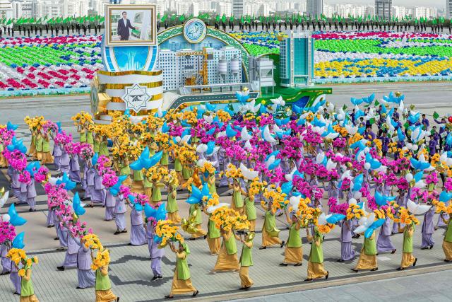 Participants attend a parade marking the 35th anniversary of Turkmenistan's independence in central Ashgabat on September 27, 2026. (Photo by Nikolay VAVILOV / AFP)