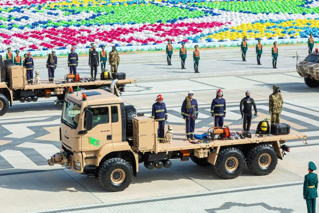 Participants attend a parade marking the 35th anniversary of Turkmenistan's independence in central Ashgabat on September 27, 2026. (Photo by Nikolay VAVILOV / AFP)