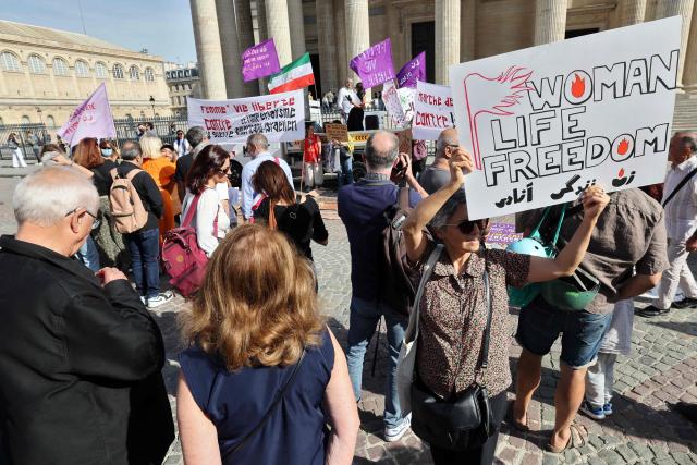 Members of collectives from the Iranian diaspora take part in a demonstration in front of the Pantheon on the occasion of the fourth anniversary of the Women, Life, Freedom movement, against repression and war, in Paris on September 27, 2026. (Photo by Mehdi FEDOUACH / AFP)