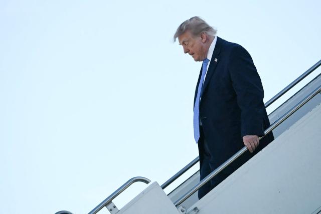 US President Donald Trump disembarks from Air Force One at Chicago O'Hare International Airport in Chicago on September 27, 2026. Trump is in Chicago to attend the President's Cup closing ceremony. (Photo by Jim WATSON / AFP)