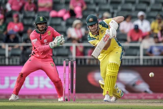 Australia's Cameron Green (R) plays a shot during the second one-day international (ODI) cricket match between South Africa and Australia at the DP World Wanderers Stadium in Johannesburg on September 27, 2026. (Photo by PHILL MAGAKOE / AFP)