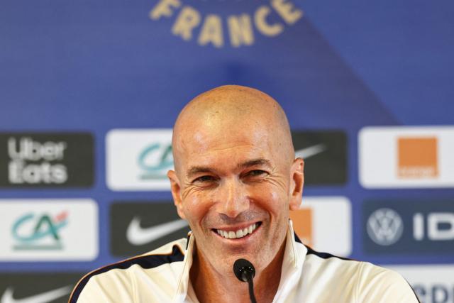 France's head coach Zinedine Zidane smiles as he speaks during a press conference on the eve of the UEFA Nations League football match between Belgium and France at King Baudouin Stadium in Brussels on September 27, 2026. (Photo by FRANCK FIFE / AFP)