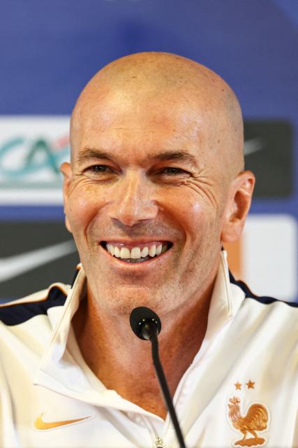 France's head coach Zinedine Zidane smiles as he speaks during a press conference on the eve of the UEFA Nations League football match between Belgium and France at King Baudouin Stadium in Brussels on September 27, 2026. (Photo by FRANCK FIFE / AFP)